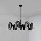 Cirkus chandelier with directional U-heads in a styled room