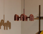 Cirkus chandelier suspended over a modern interior