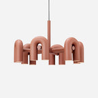 Cirkus chandelier with bold colour finish lit warm