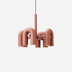Cirkus chandelier glowing above a contemporary interior