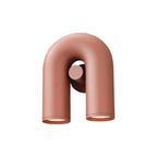 This terracotta Clérachic wall light faces forward, unlit, on a plain white backdrop.