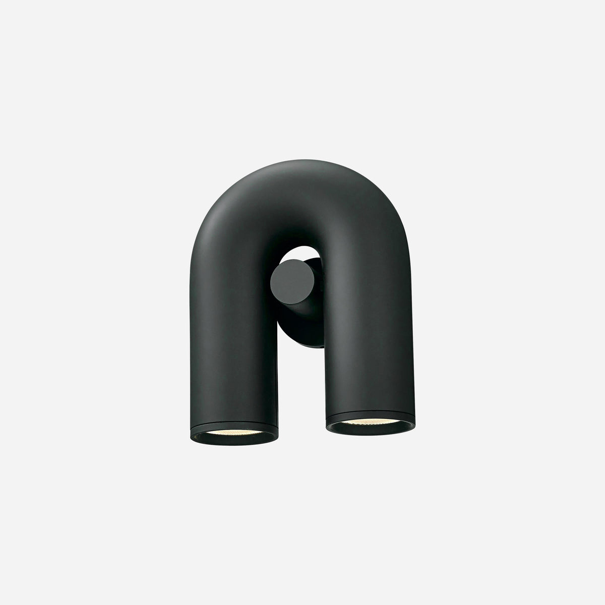 This black Clérachic wall light faces forward, unlit, on a plain light backdrop.