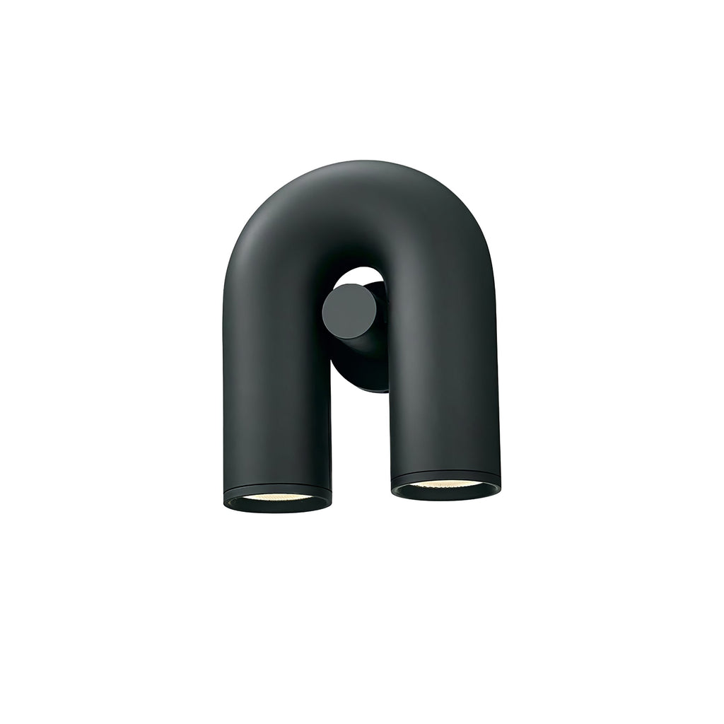 This black Clérachic wall light turns slightly to show its profile, unlit against white.