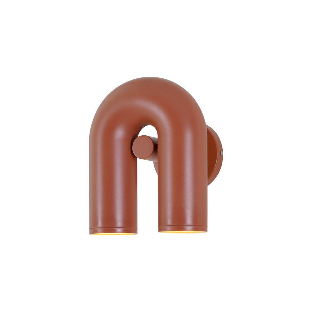 Side view of this terracotta Clérachic wall light reveals its wall-mounting plate, unlit.