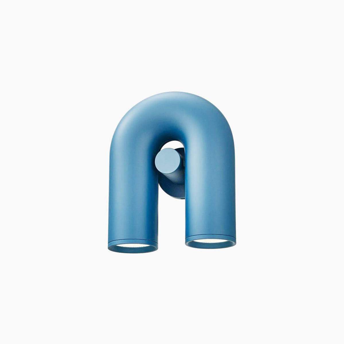 This blue Clérachic wall light faces forward, unlit, on a plain light backdrop.