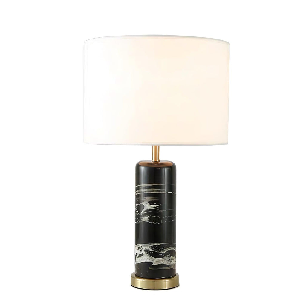 Full studio shot of the Clérachic table lamp on white, showing the fabric shade and veined marble base together.