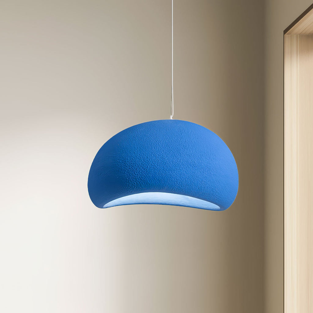Soft cloud pendant light diffusing warm light from the ceiling