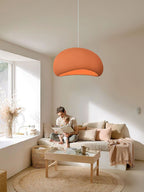Round cloud pendant light casting a dreamlike glow overhead