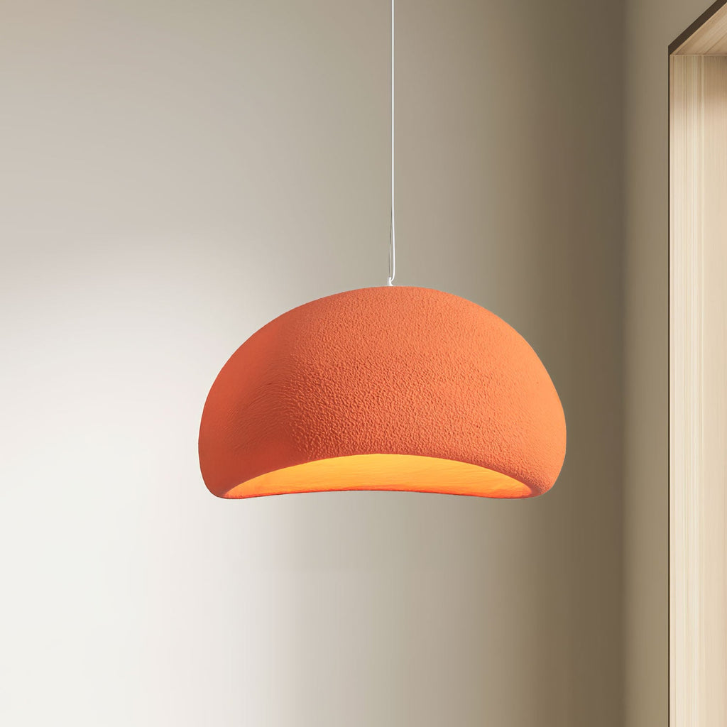 Soft sphere cloud pendant light glowing in a quiet corner