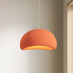 Soft sphere cloud pendant light glowing in a quiet corner