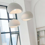 Wabi-sabi organic chandelier with cloud-like form over a space