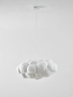 Unlit against plain white, this Clérachic cloud-shaped pendant hangs from its round ceiling canopy.