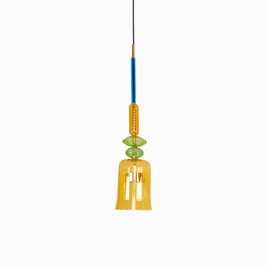 A single amber fluted glass bell shade hangs below a green bead on this Clérachic pendant, shown on white.