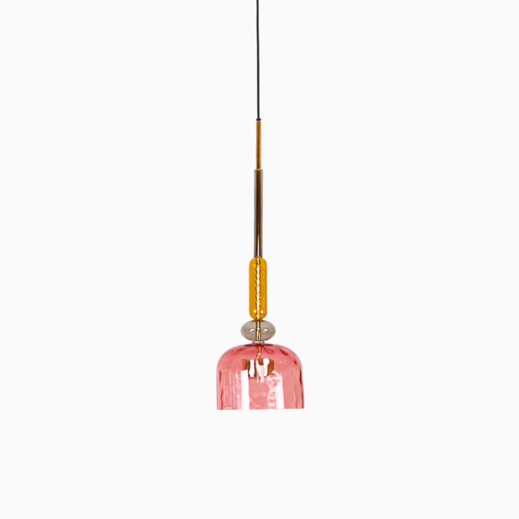 A single coral ribbed bell shade hangs from an amber stem on this Clérachic pendant, shown on a plain background.