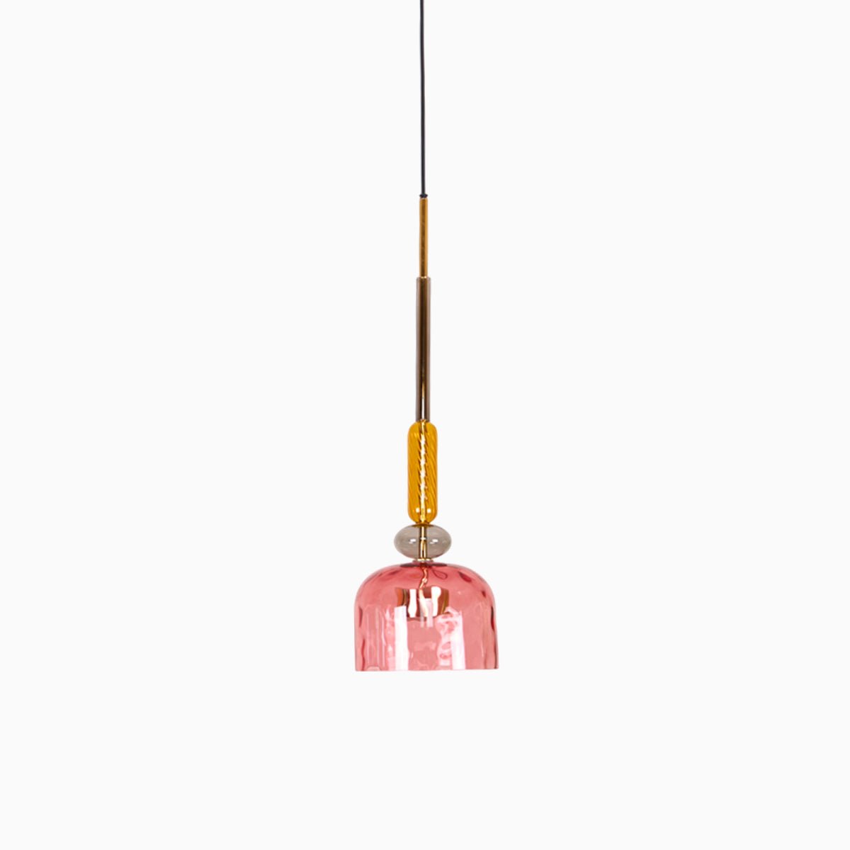 A single coral ribbed bell shade hangs from an amber stem on this Clérachic pendant, shown on a plain background.