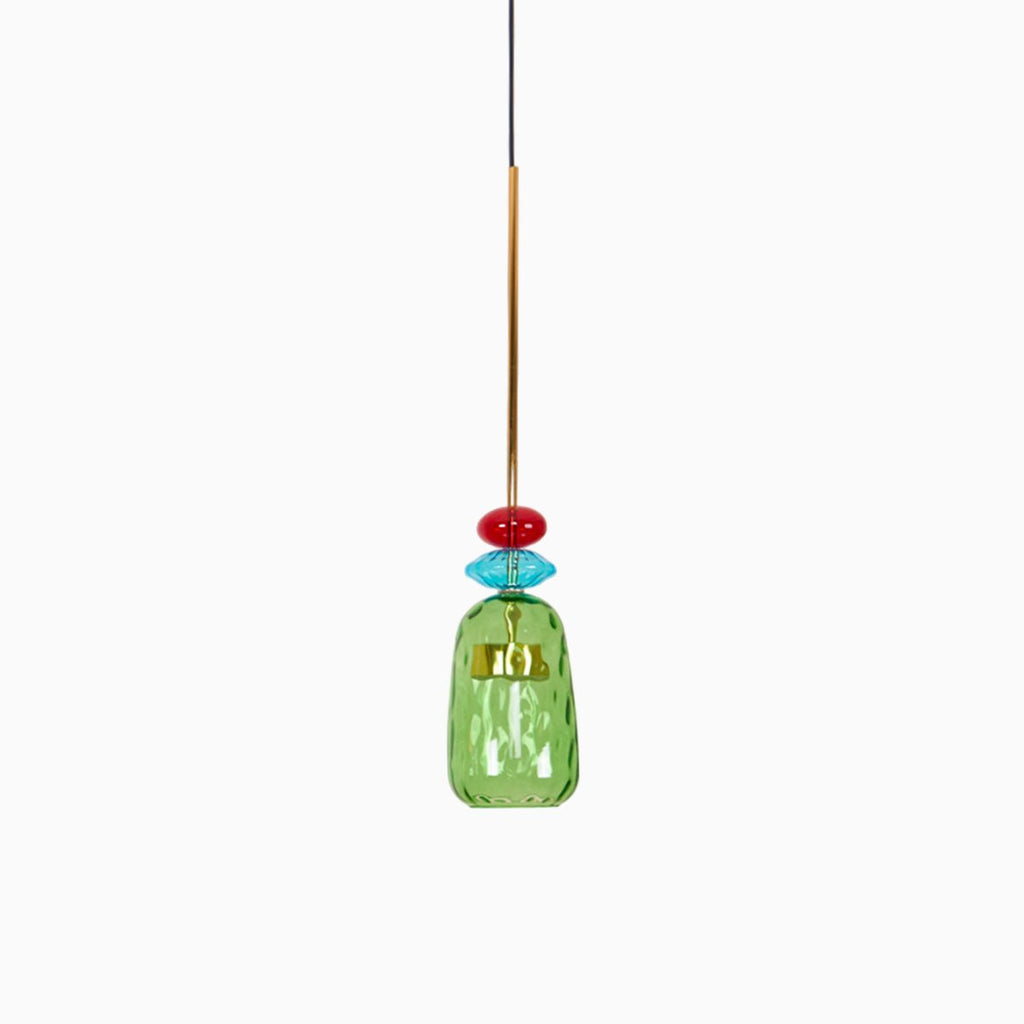 A single green ribbed bottle shade hangs below a red glass bead on this Clérachic pendant, isolated on white.