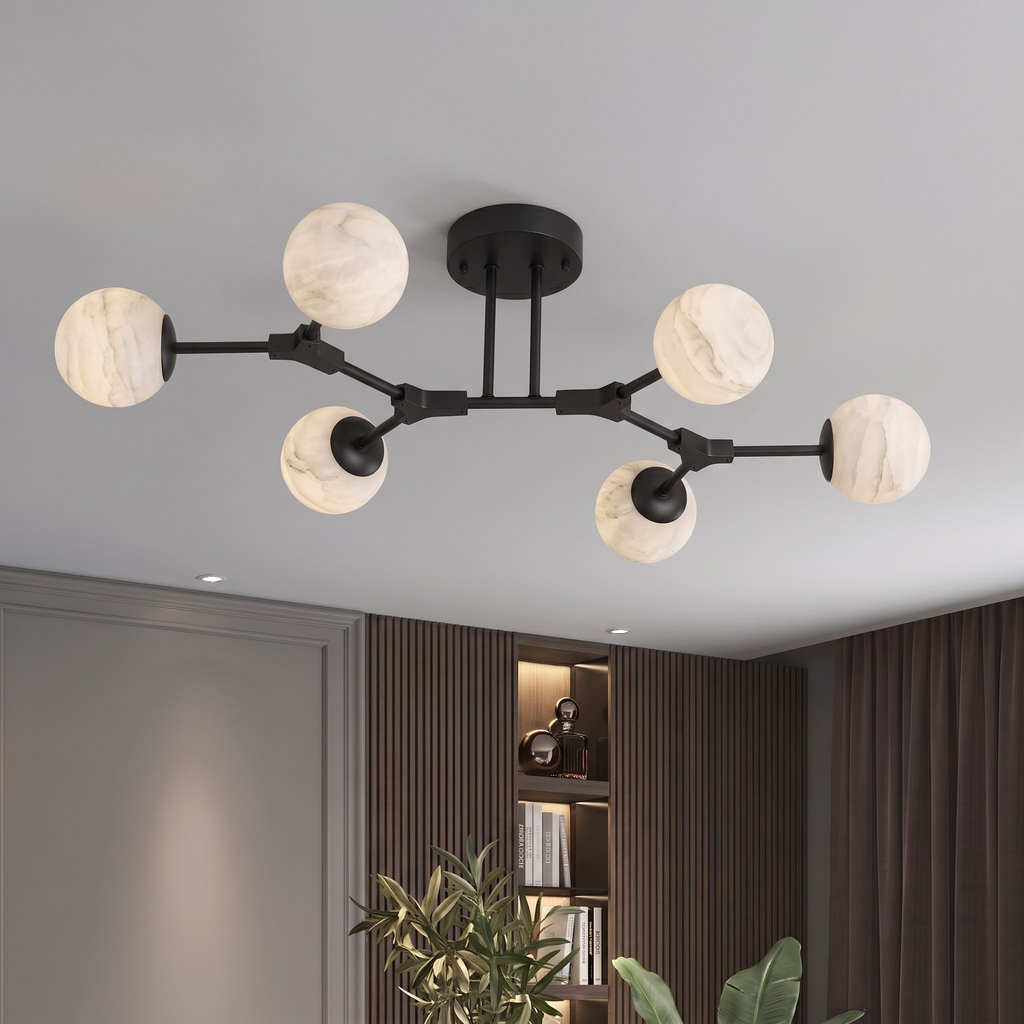 Photographed in matte black against white, this Clérachic chandelier's six arms fan out at differing lengths.