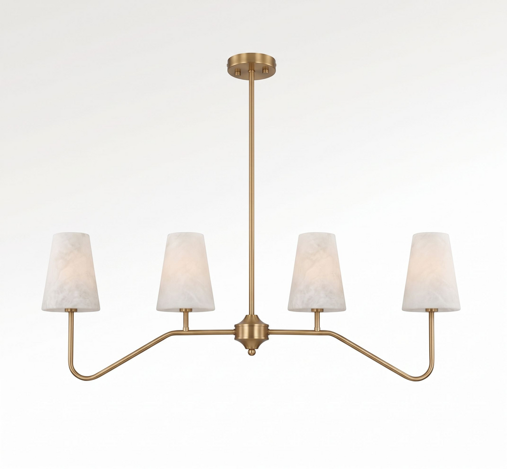 Front view on a plain white backdrop, this Clérachic chandelier's brushed brass arms fan out to four tapered alabaster cone shades.