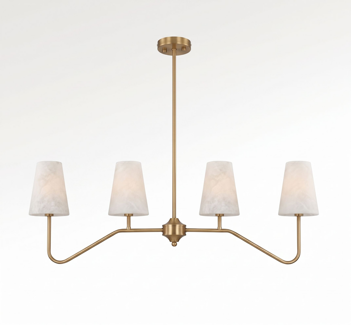 Front view on a plain white backdrop, this Clérachic chandelier's brushed brass arms fan out to four tapered alabaster cone shades.