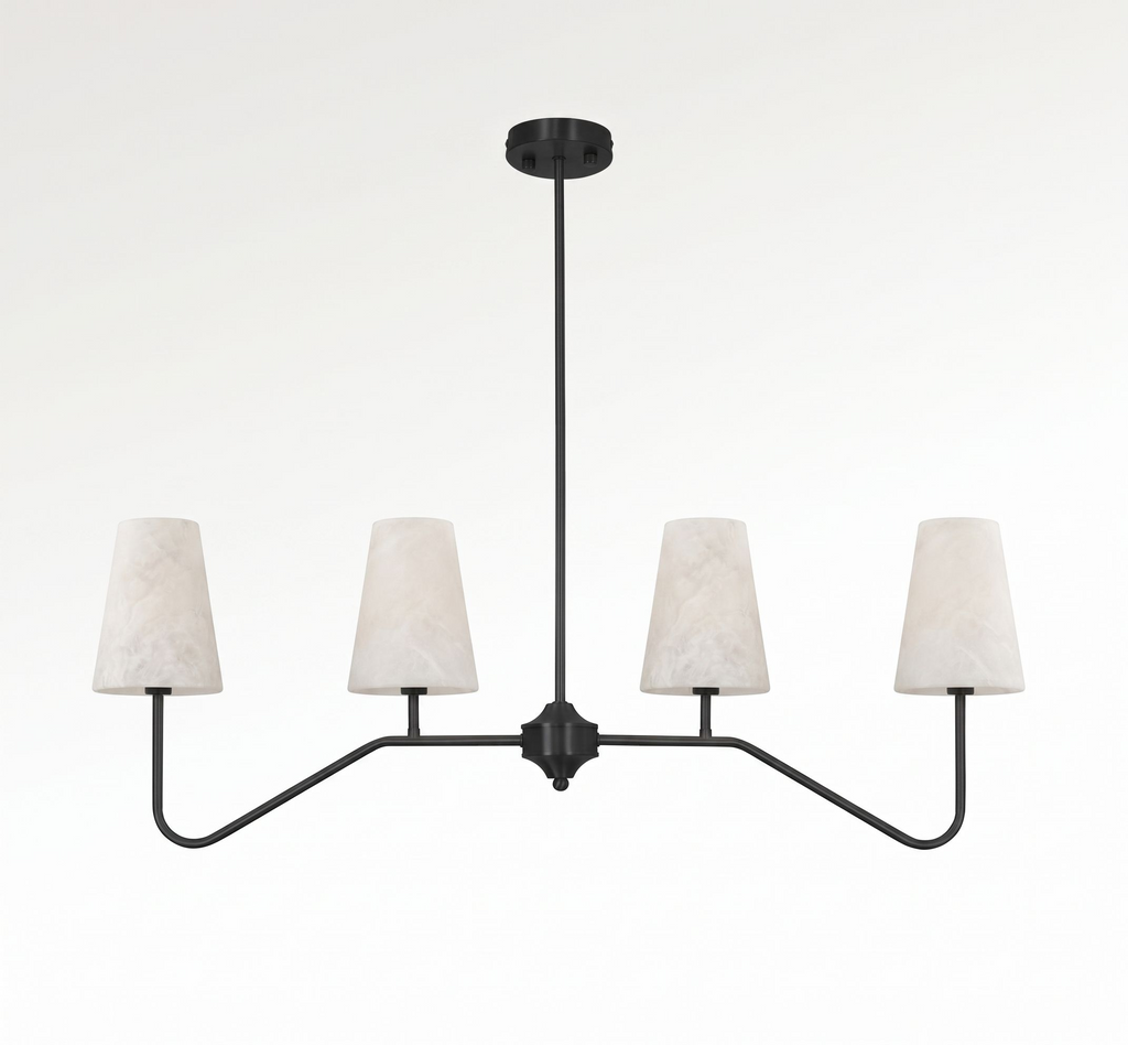 Straight-on against a white backdrop, this Clérachic chandelier's matte black arms fan out to four alabaster cone shades.