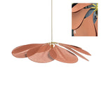 This Clérachic pendant lamp in copper-toned petals is shown at an angle, with a close-up inset of where the petals meet the frame.