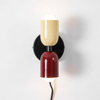 Plug-in wall lamp mounted horizontally with a gentle glow