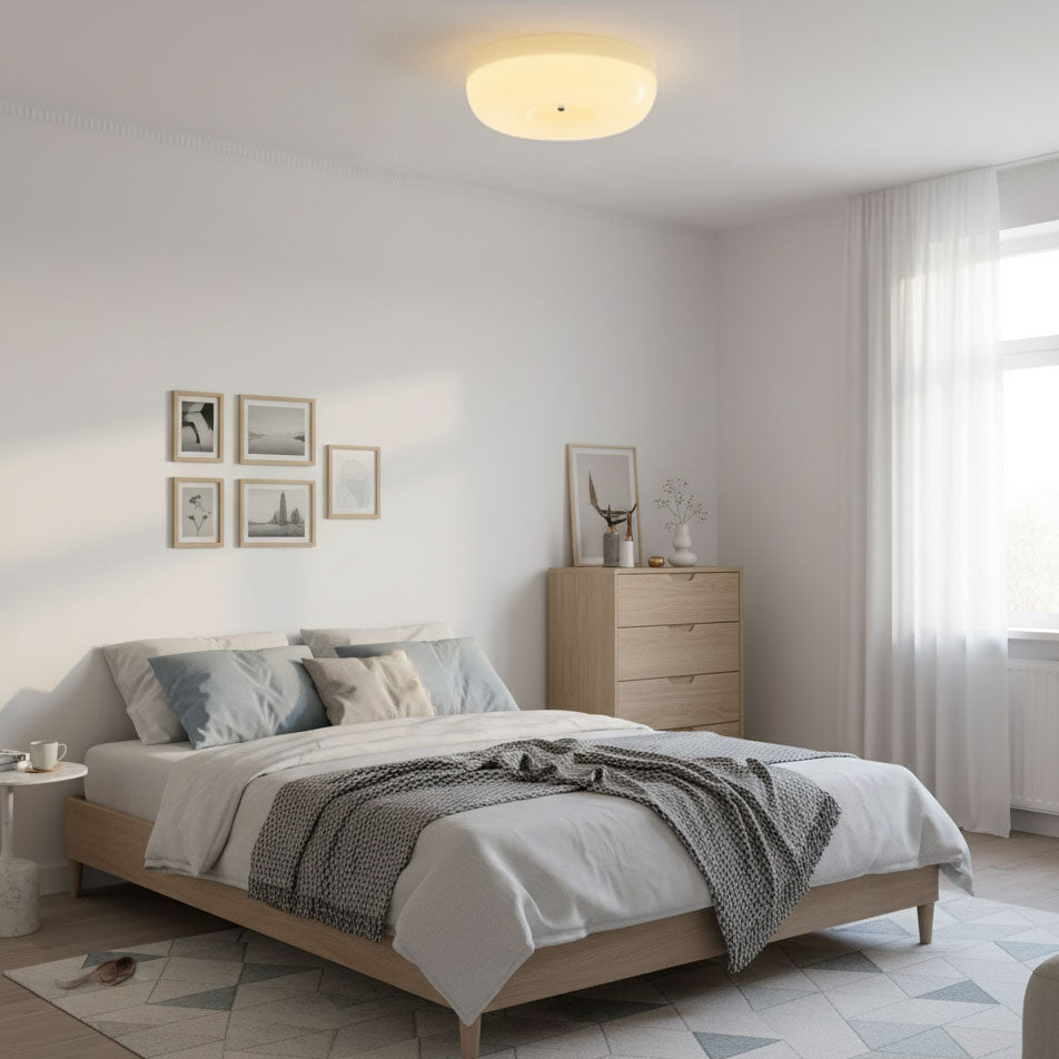 Cream Pudding ceiling light glowing above a room