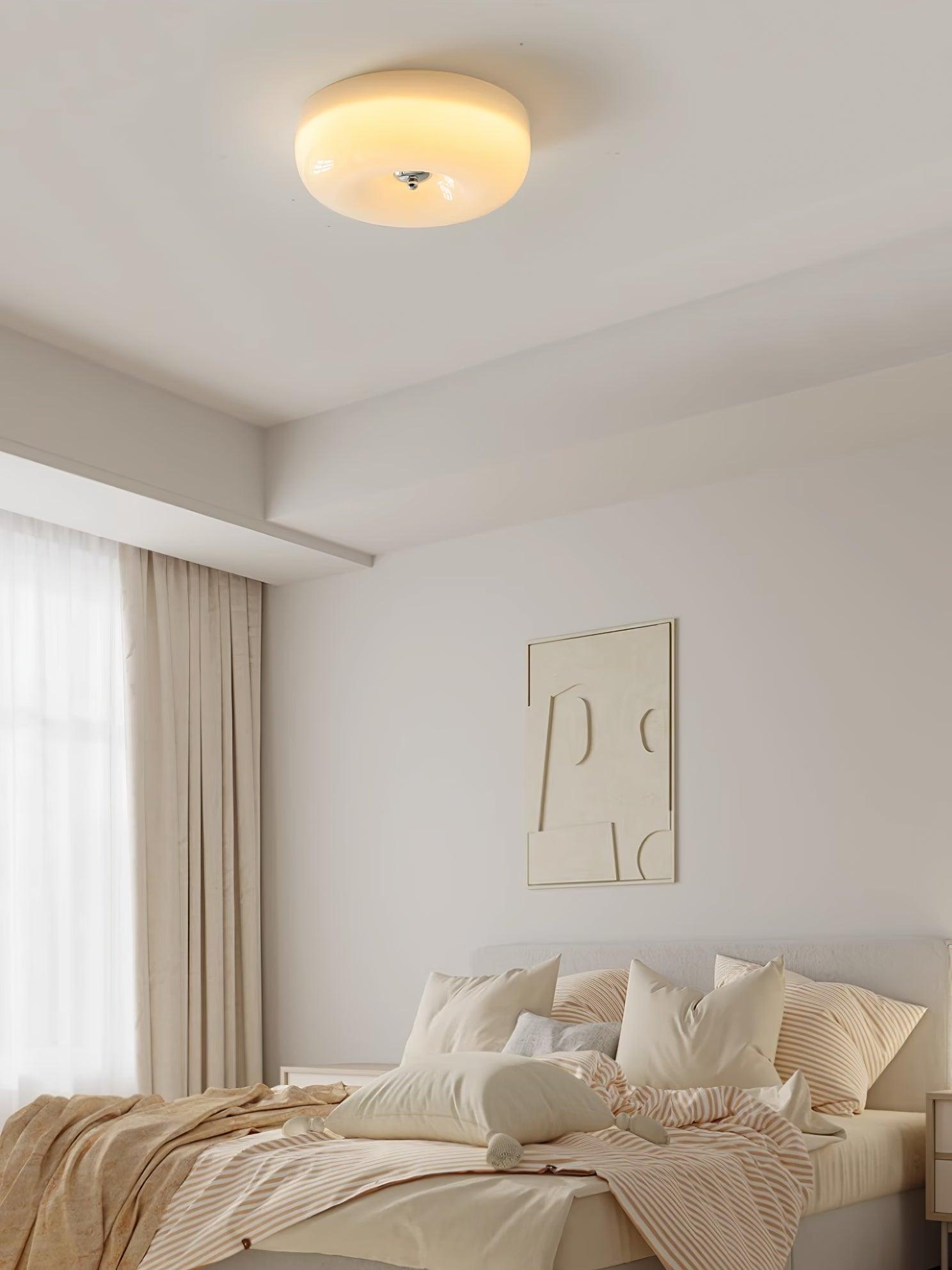 Cream Pudding ceiling light mounted against a pale ceiling