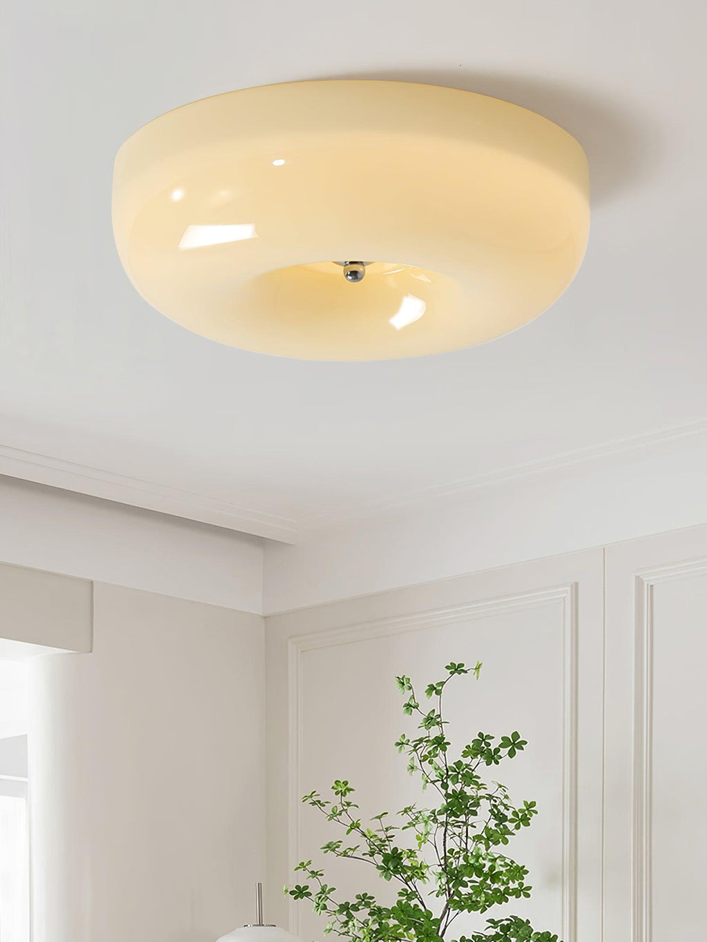 Cream Pudding ceiling light glowing softly overhead