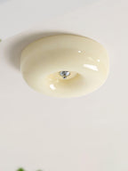 Cream Pudding ceiling light glowing evenly in a space