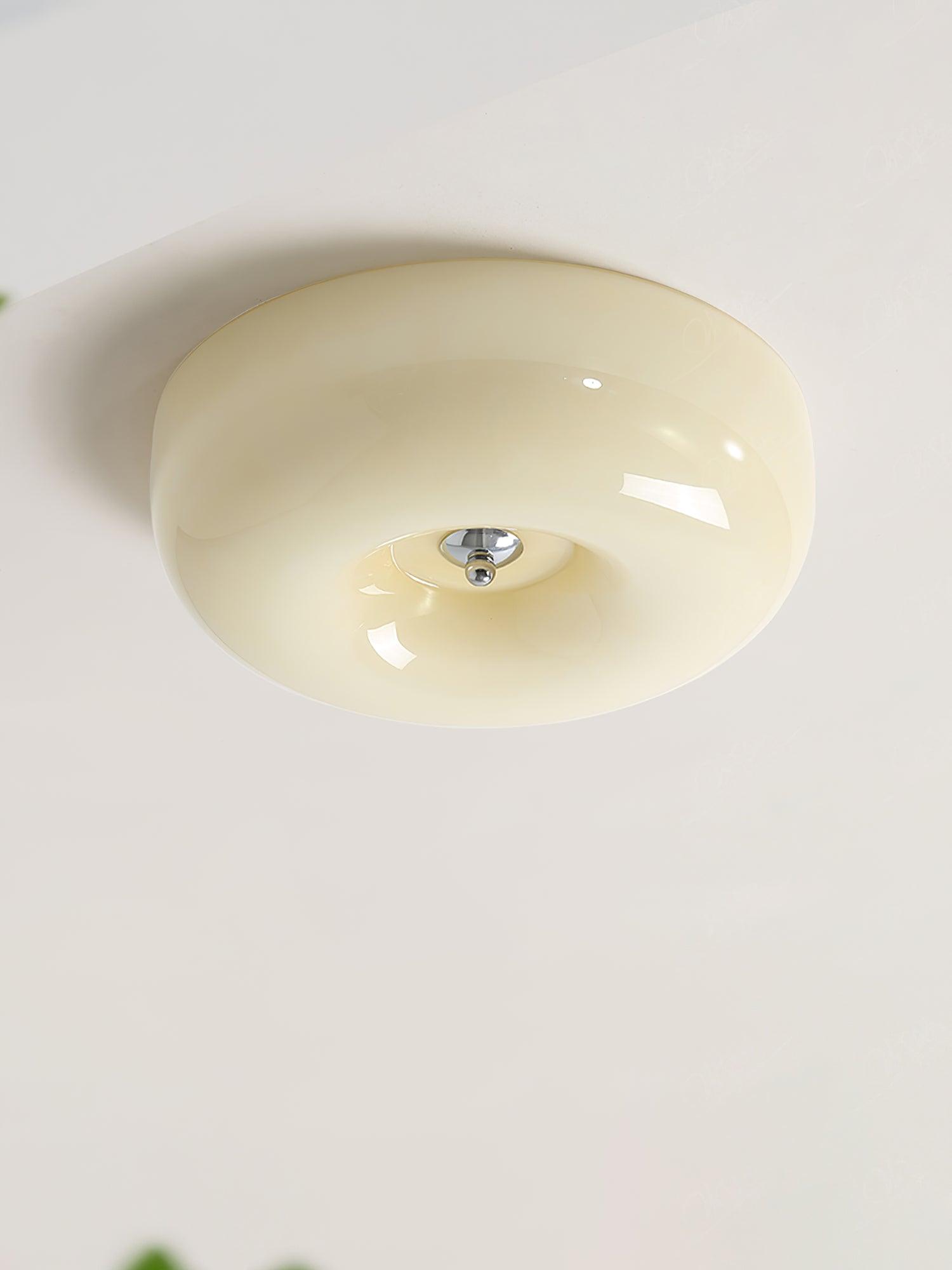 Cream Pudding ceiling light glowing evenly in a space
