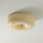 Cream Pudding ceiling light glowing softly with matt glass shade
