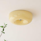 Cream Pudding ceiling light round shade against a ceiling