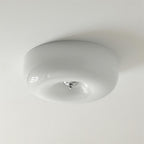 Round matt glass Cream Pudding ceiling light lit warm