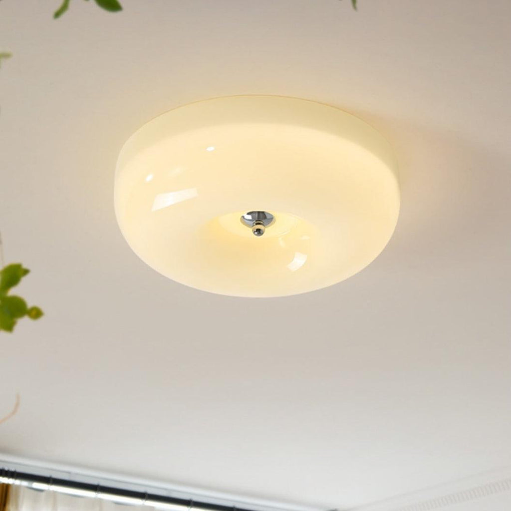 Cream Pudding ceiling light glowing in a calm interior