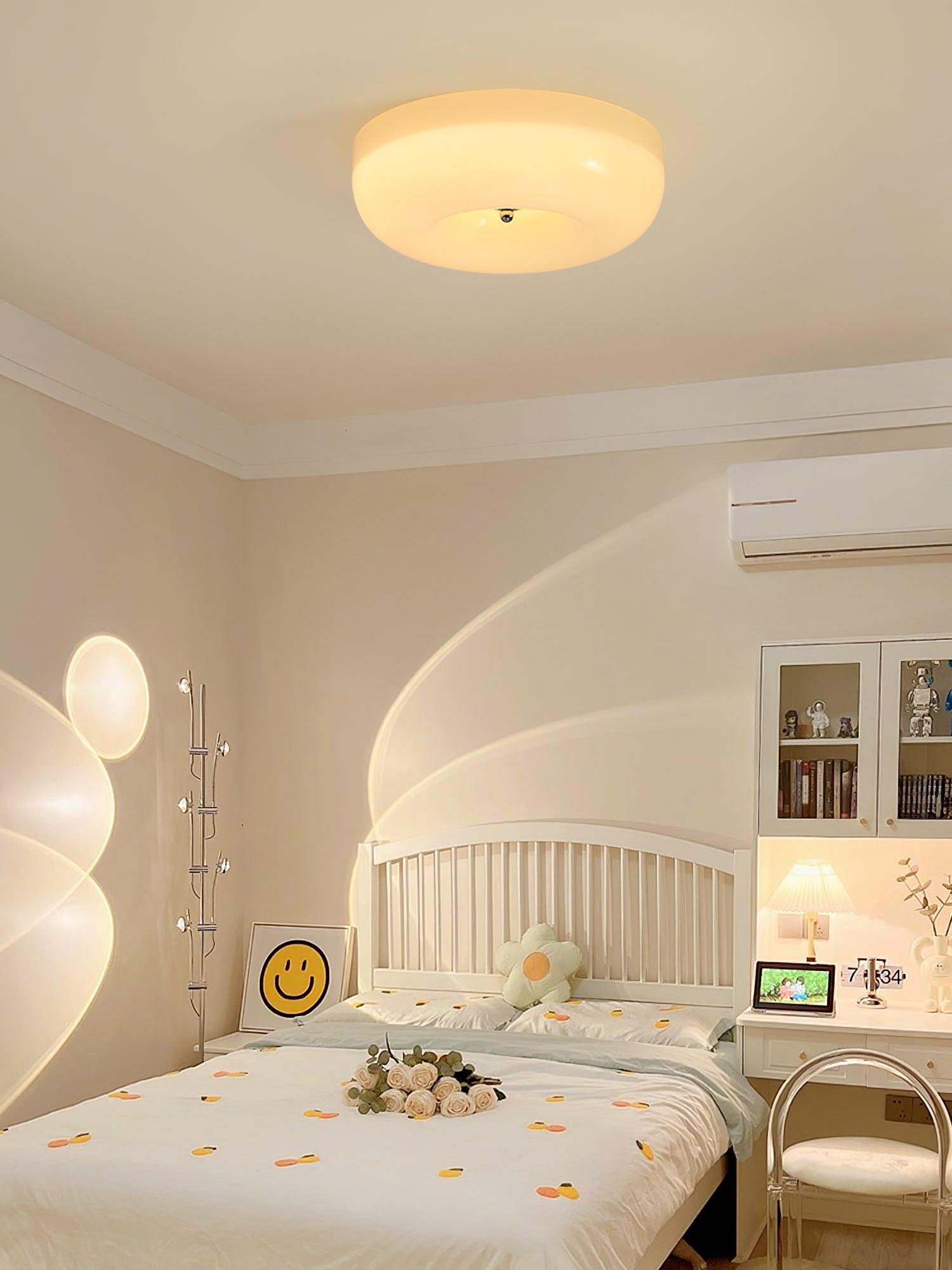 Cream Pudding ceiling light glowing gently in a hallway