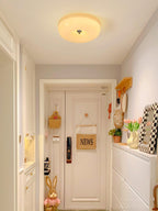 Cream Pudding ceiling light round shade lit evenly