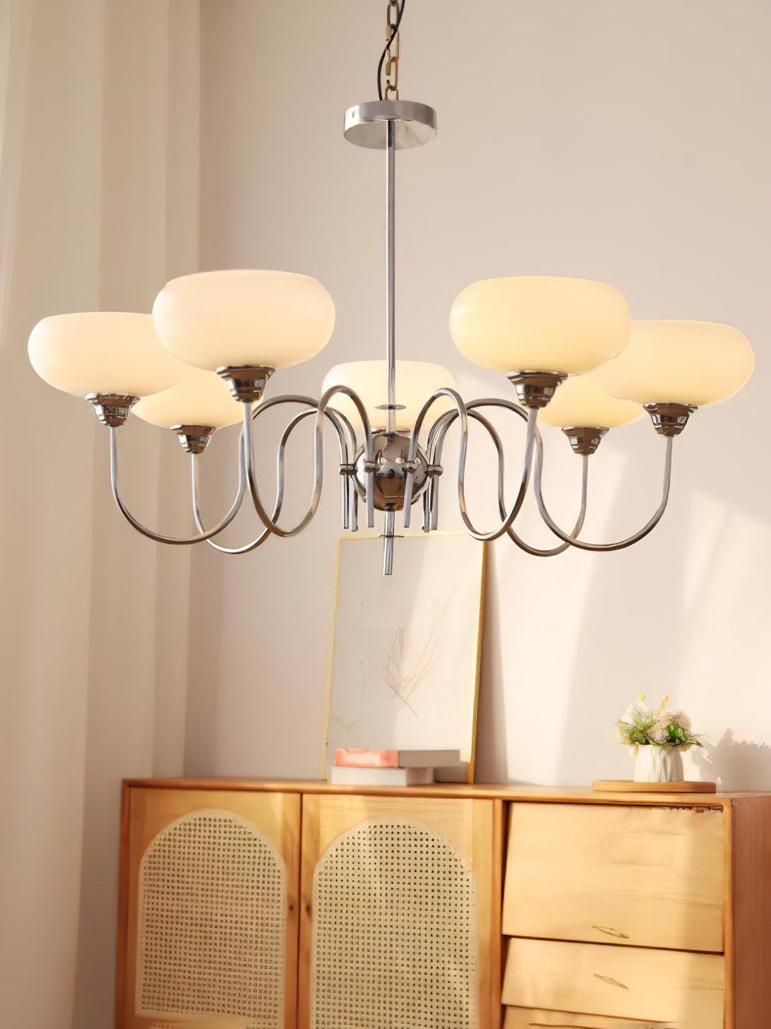 Persimmon chandelier with chrome body and milk-white globes