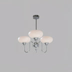 Persimmon chandelier glowing softly above a living space