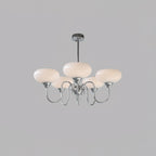 Persimmon chandelier with gold body and milk-white shades