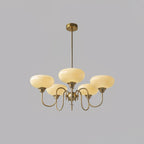 Creamy glass globe detail on the persimmon chandelier
