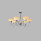 Persimmon chandelier glass shades catching warm light
