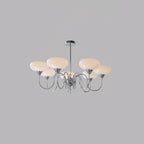 Persimmon chandelier with chrome body and creamy glass globes