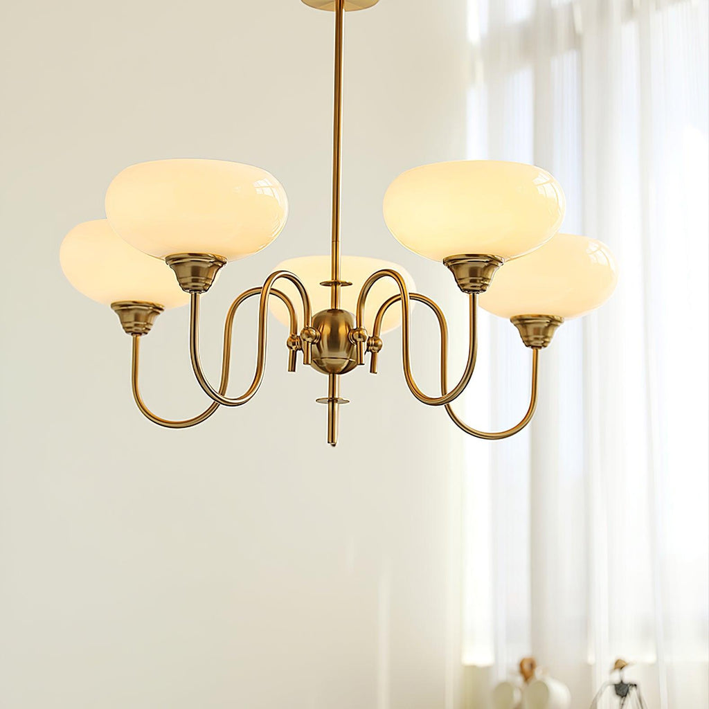 Persimmon chandelier glass cluster against a pale wall