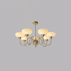 Warm-lit persimmon chandelier in a styled room