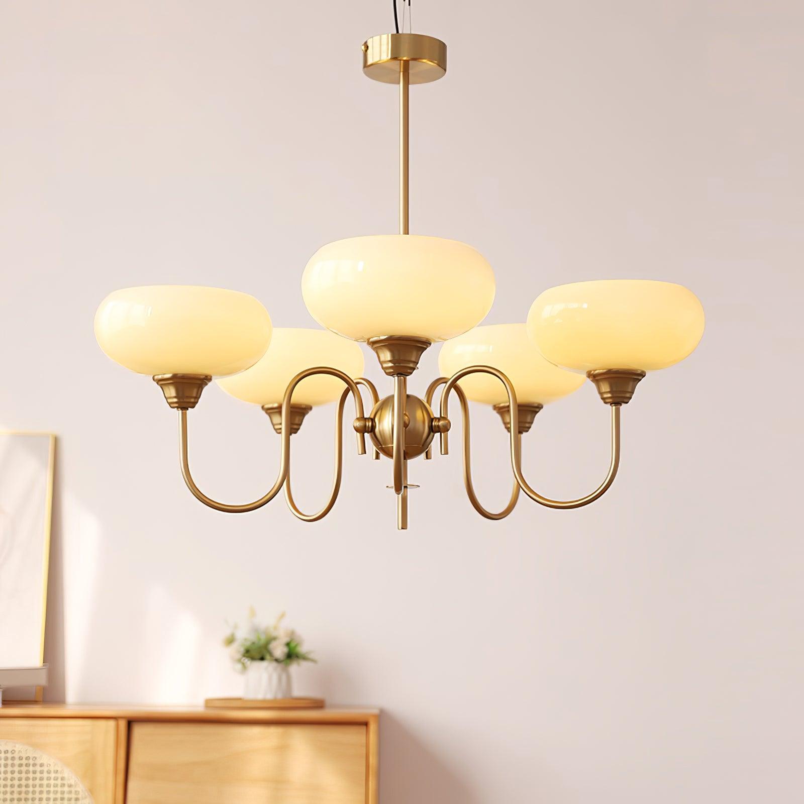 Persimmon chandelier hanging as a sculptural centrepiece