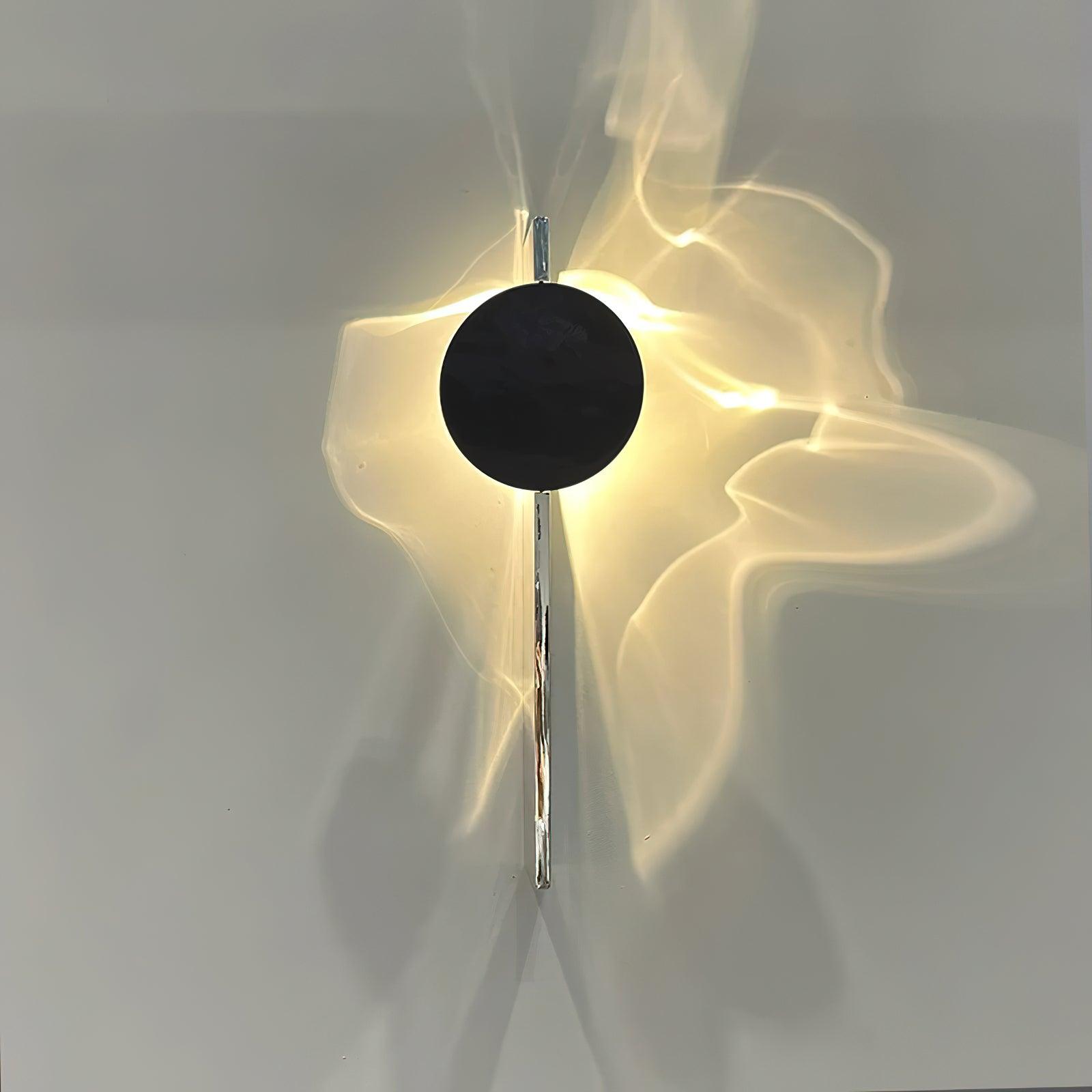Polished chrome wall lamp with a slim near-flush back panel