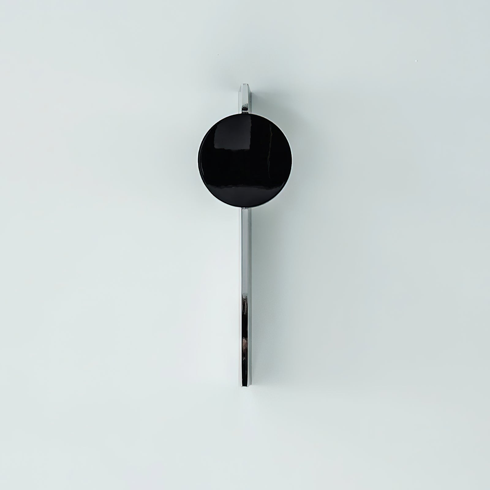 Chrome light-and-shadow wall lamp with warm LED accent