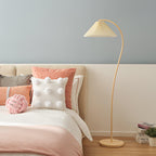 Full view of the pleated floor lamp in a styled mid-century room