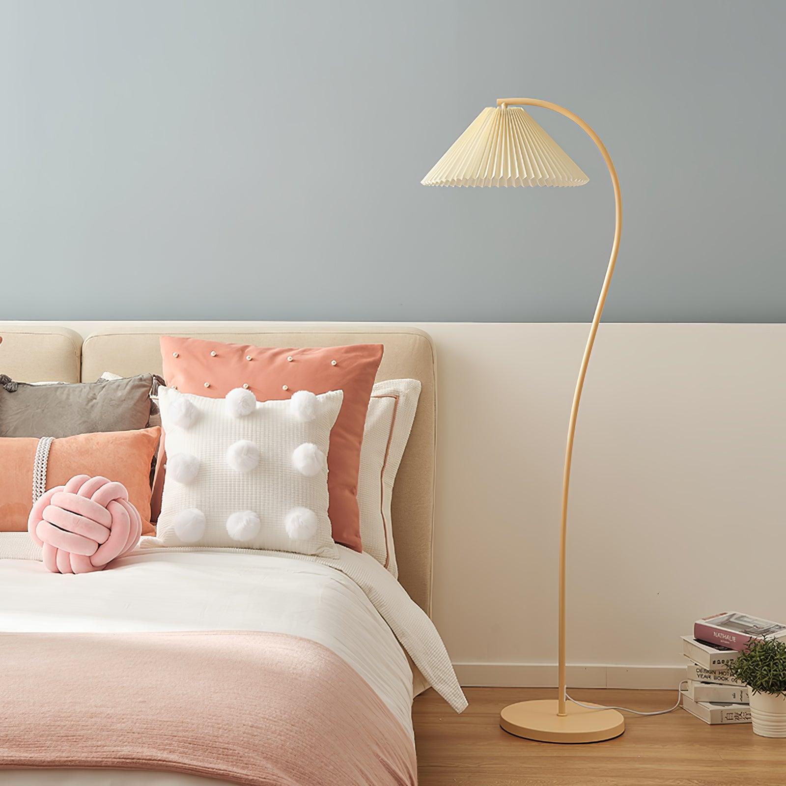 Full view of the pleated floor lamp in a styled mid-century room